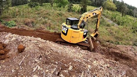 building a road with a mini excavator|Building a New Access Road with a Mini Excavator .